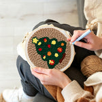 Creating handmade star topped christmas tree unch needle artwork