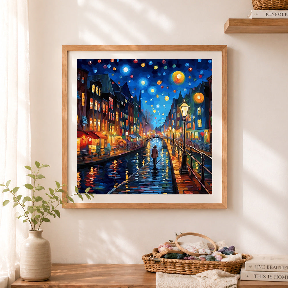 Finished starry canal cityscape cross stitch artwork displayed as home decor