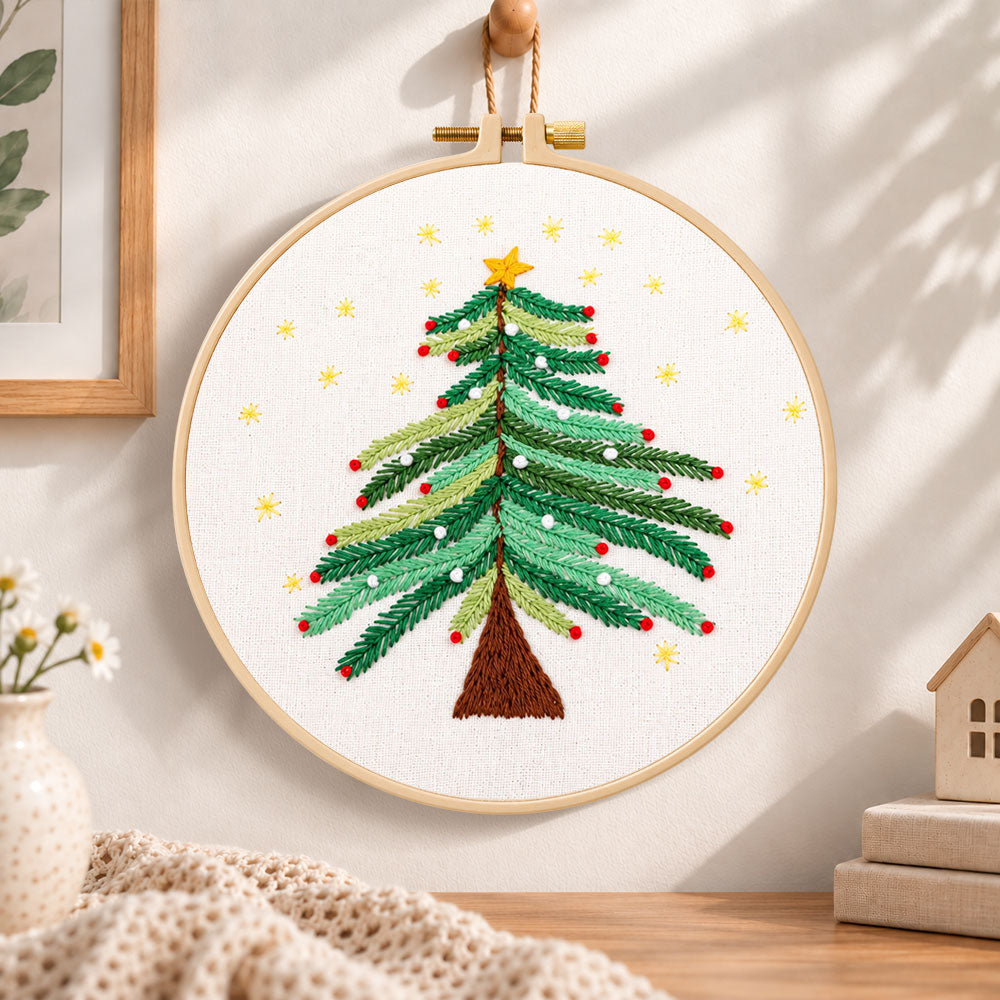 Starry christmas tree with stars embroidery hoop wall art displayed as warm and cozy handmade home decor