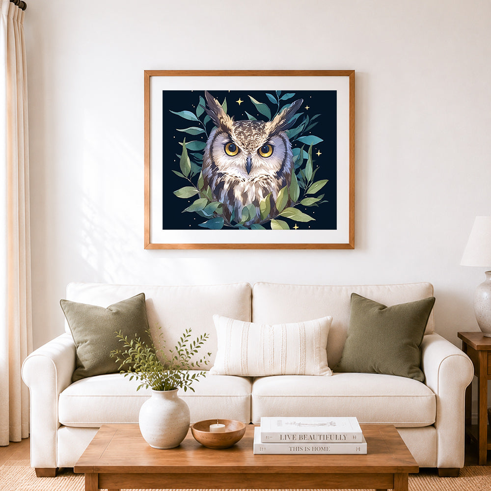 Finished starry foliage owl portrait cross stitch artwork displayed as home decor