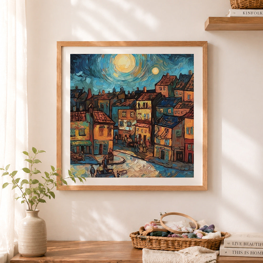 Finished starry night old town street art cross stitch artwork displayed as home decor