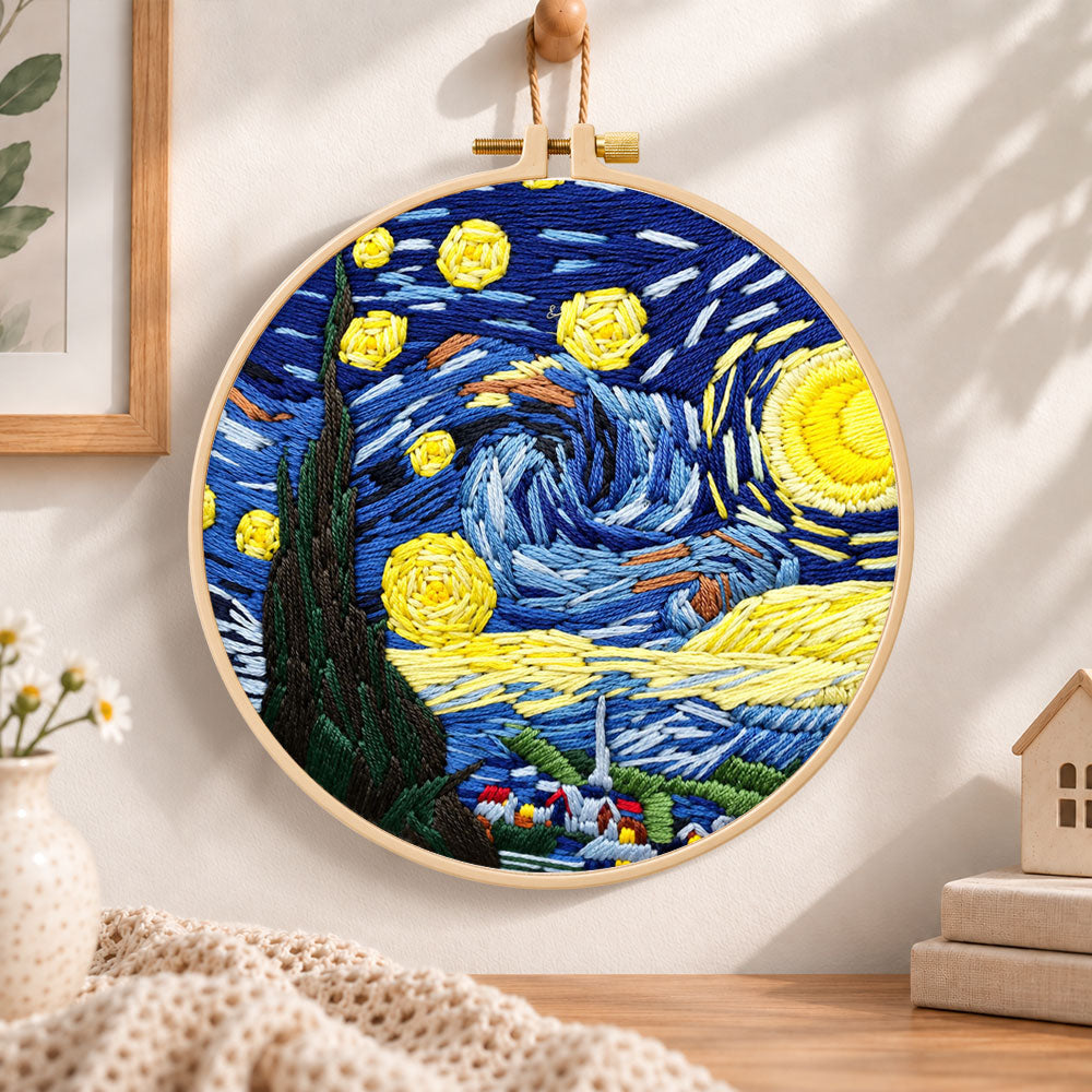 Starry night sky embroidery hoop wall art displayed as warm and cozy handmade home decor