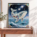 Finished starry ocean whale pearl diamond painting artwork displayed as home decor