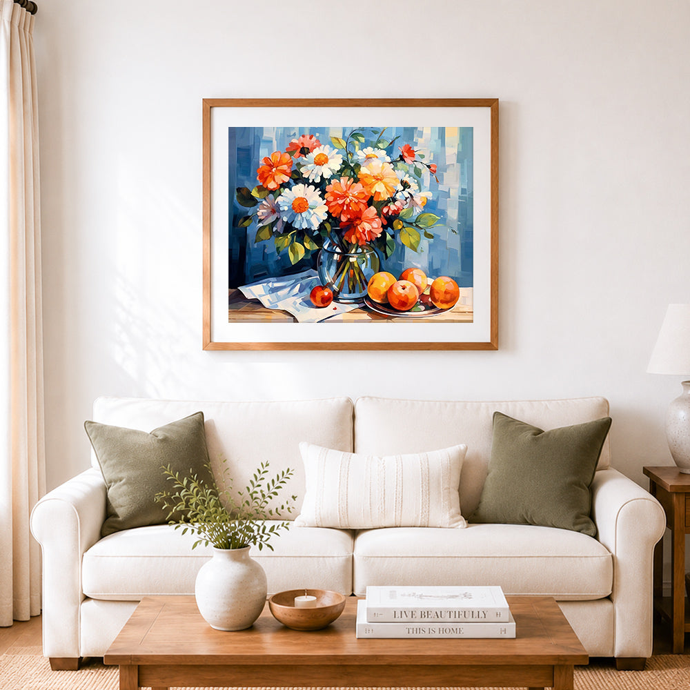 Finished still life with blooms and citrus cross stitch artwork displayed as home decor