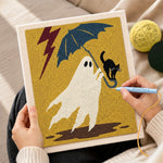 Creating handmade stormy ghost with black cat punch needle artwork