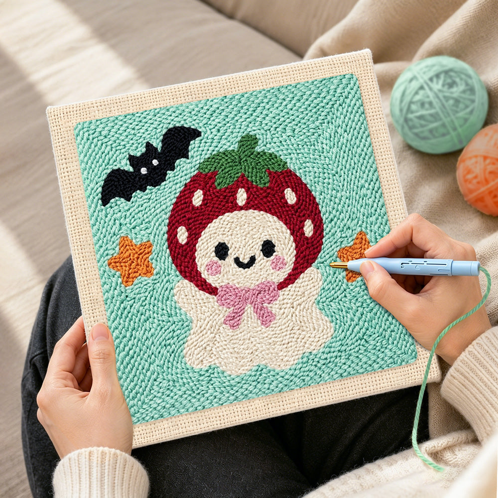 Creating handmade strawberry ghost punch needle artwork