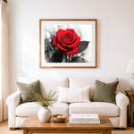 Finished striking crimson bloom cross stitch artwork displayed as home decor