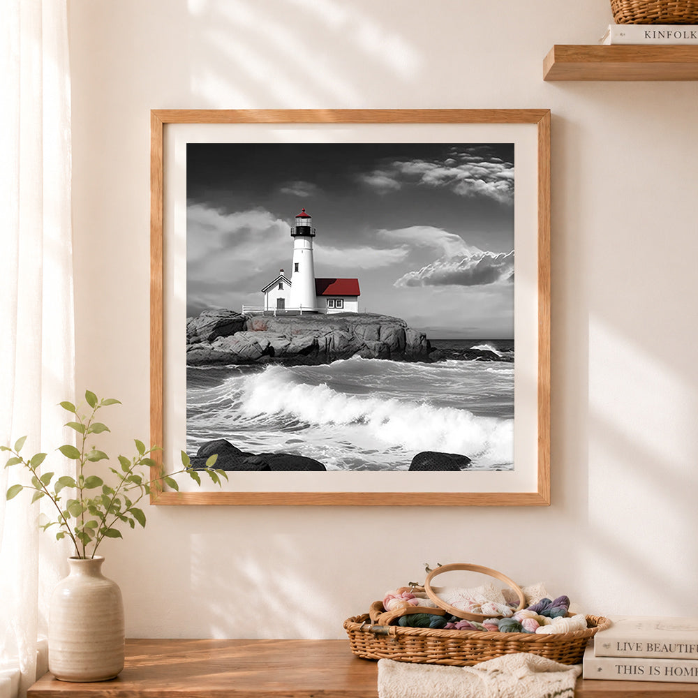 Finished stunning black and white lighthouse with red roof cross stitch artwork displayed as home decor