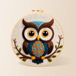 Stylish blue and orange owl needle felting kit for beginners with a round wooden frame
