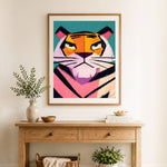 Finished stylized tiger face cross stitch artwork displayed as home decor