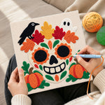 Creating handmade sugar skull with fall foliage punch needle artwork