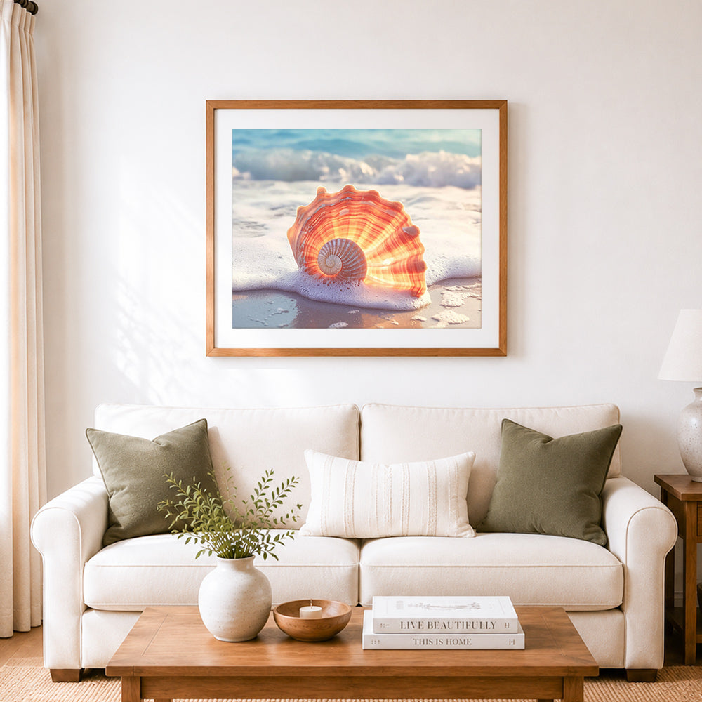 Finished sun‑kissed beach conch cross stitch artwork displayed as home decor