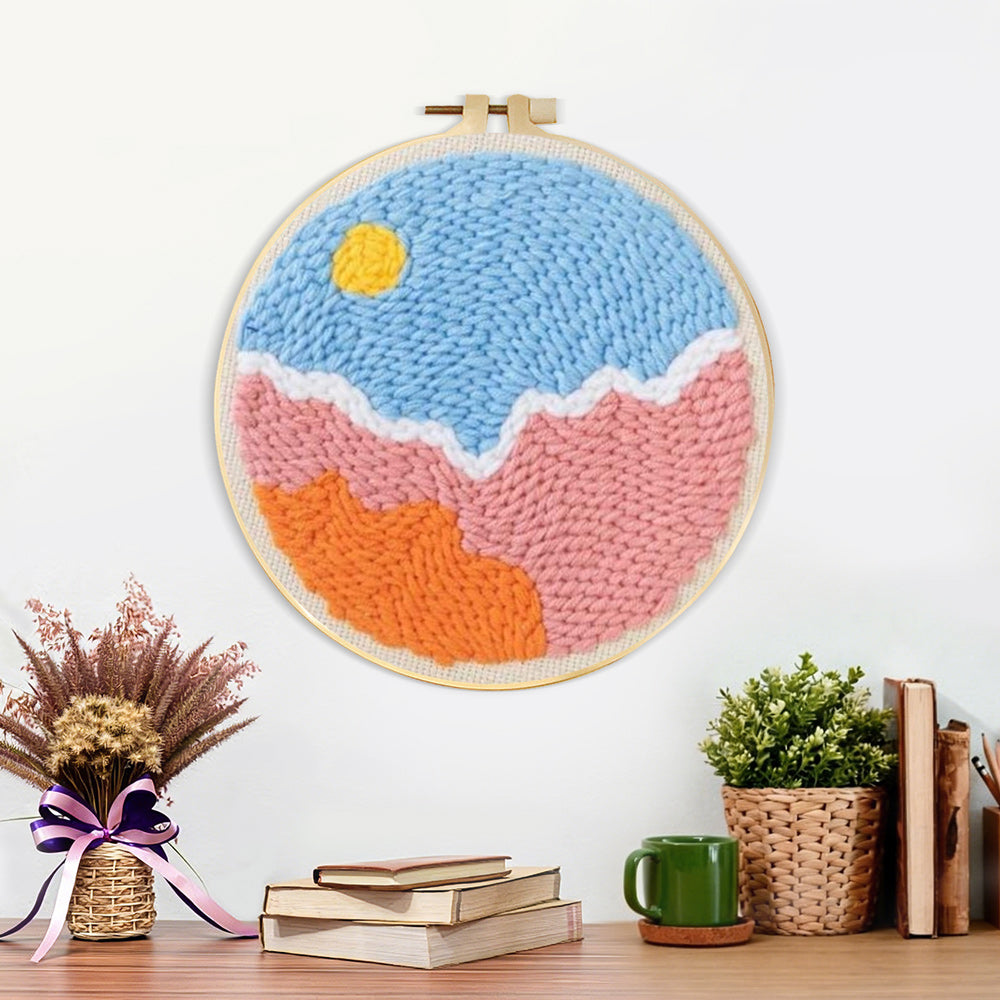 Finished sun over colorful clouds artwork displayed on a wall