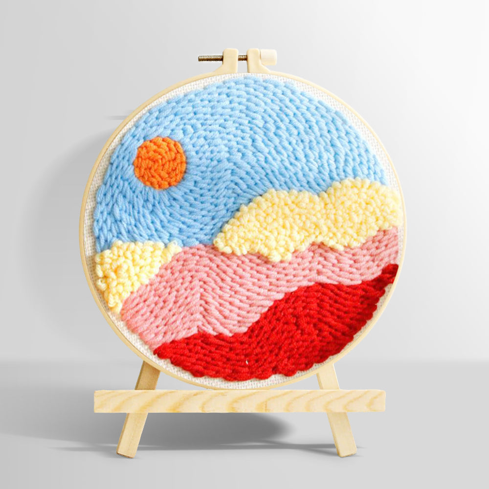 Sun over colorful mountains and clouds punch needle kit for beginners