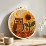 Sunflower owl punch needle artwork displayed on a table