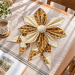 Sunflower handmade quilted bow displayed on a table as seasonal home decor