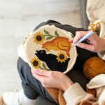 Creating handmade sunflowers and cats punch needle artwork
