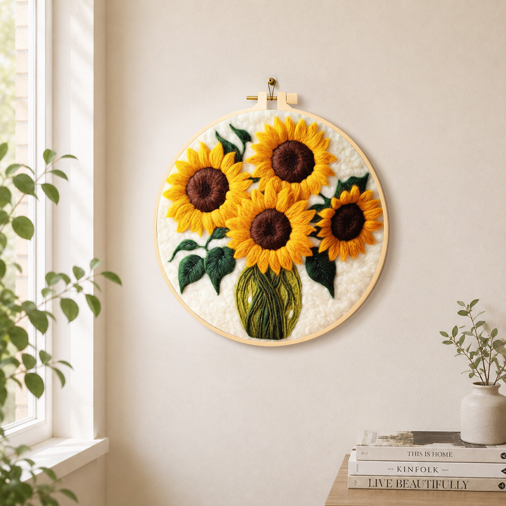 Sunflowers in a green vase needle felt wall art displayed in a bright home interior