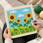 Creating handmade sunflowers under the sky punch needle artwork