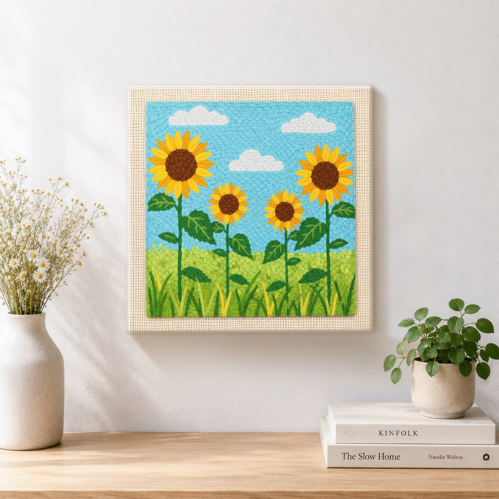 Finished sunflowers under the sky artwork displayed on a wall