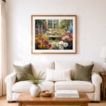 Finished sunlit garden bench surrounded by flowers cross stitch artwork displayed as home decor
