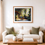 Finished sunlit greenhouse library with blue sofas cross stitch artwork displayed as home decor