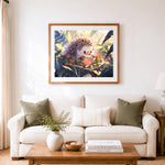 Finished sunlit reading hedgehog cross stitch artwork displayed as home decor
