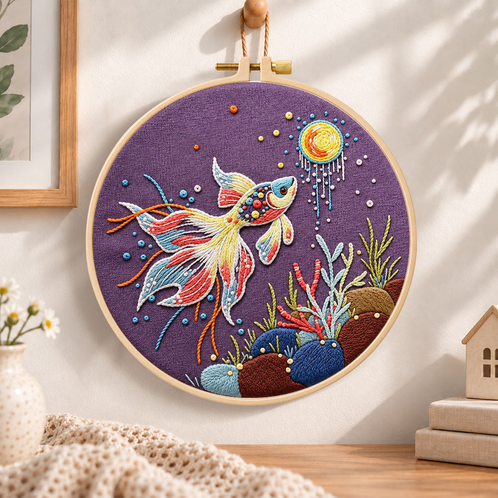 Sunlit underwater koi embroidery hoop wall art displayed as warm and cozy handmade home decor