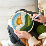 Creating handmade sunny morning over green hills punch needle artwork