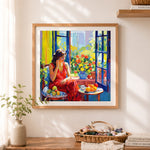 Finished sunny window lady still life cross stitch artwork displayed as home decor