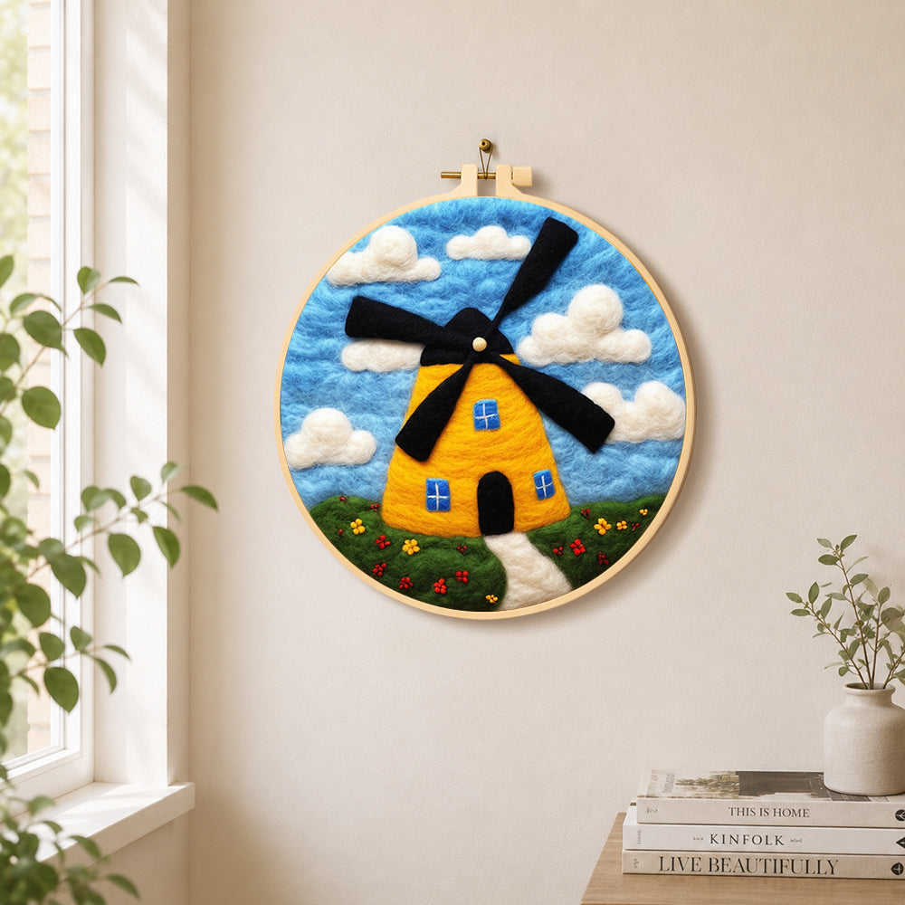 Sunny yellow windmill needle felt wall art displayed in a bright home interior