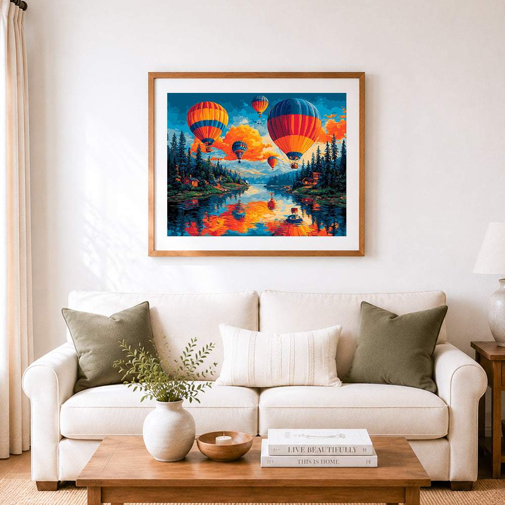 Finished sunset hot air balloons cross stitch artwork displayed as home decor
