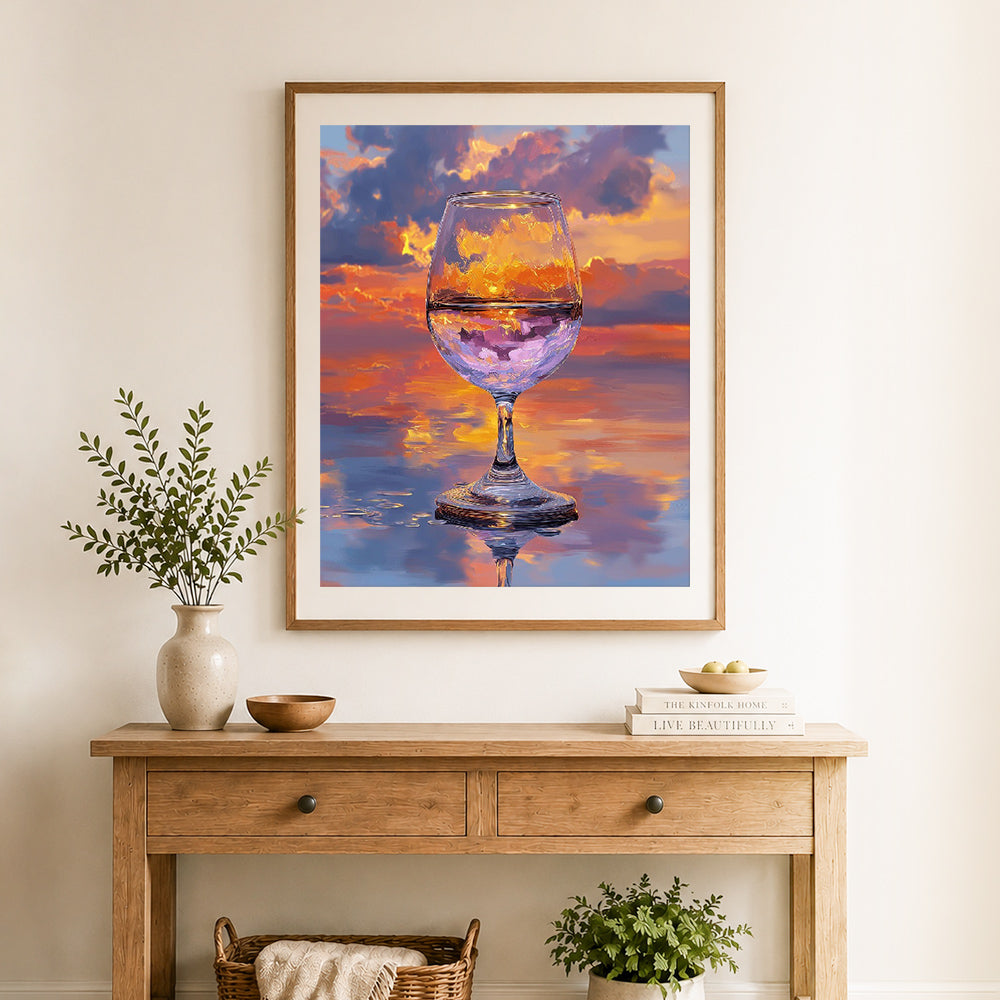 Finished sunset in wine glass cross stitch artwork displayed as home decor