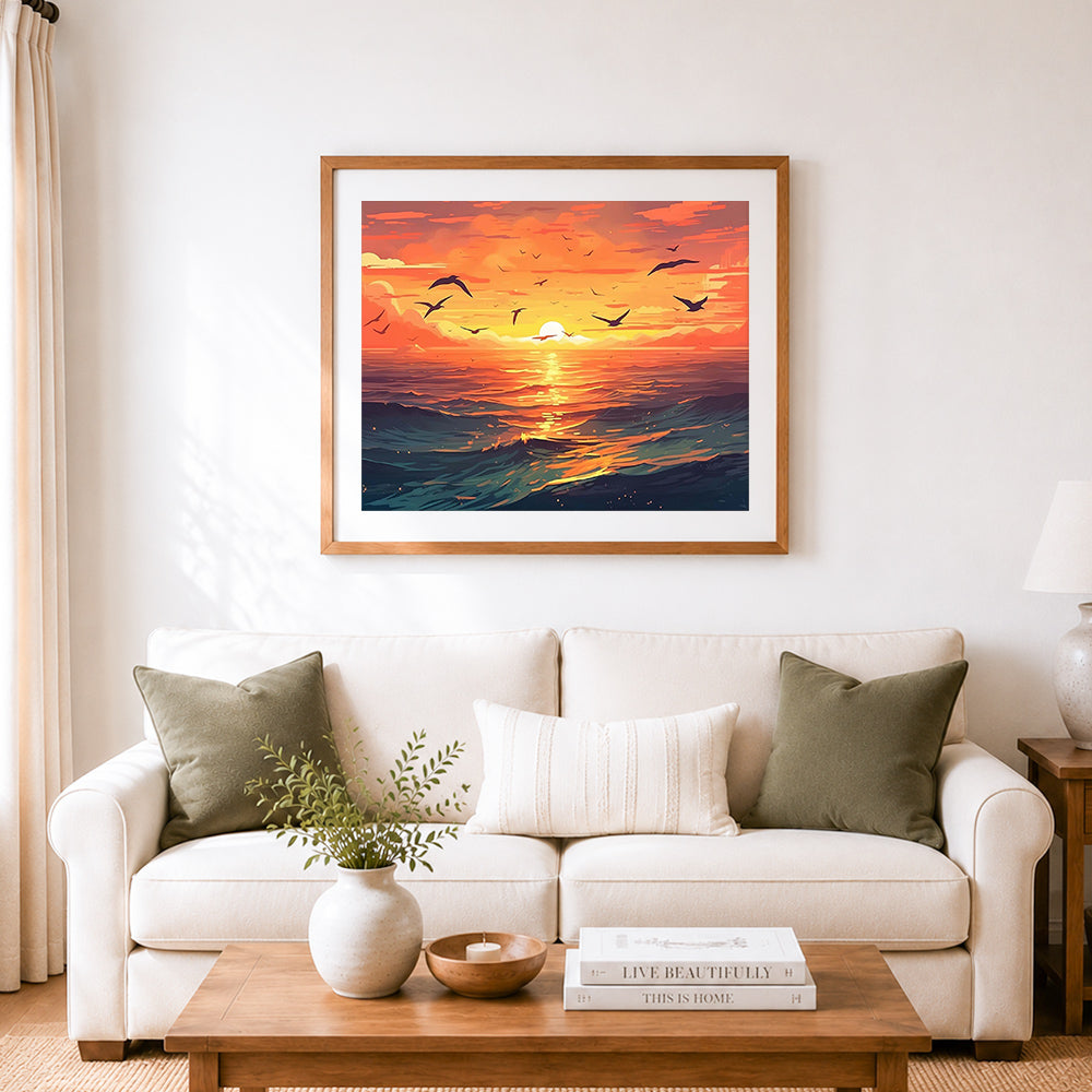 Finished sunset over ocean waves cross stitch artwork displayed as home decor