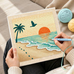 Creating handmade sunset, palm tree and footprints punch needle artwork