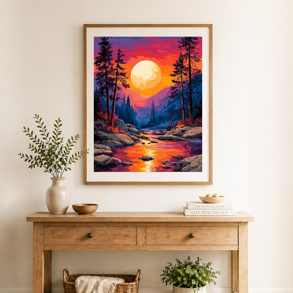 Finished sunset river glow cross stitch artwork displayed as home decor
