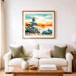 Finished sunset stacked shore stones cross stitch artwork displayed as home decor