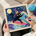Creating handmade surfing witch black cat punch needle artwork