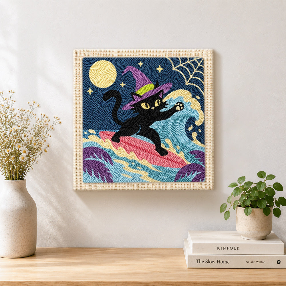 Finished surfing witch black cat artwork displayed on a wall