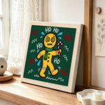 Sweating dizzy gingerbread man punch needle artwork displayed on a table