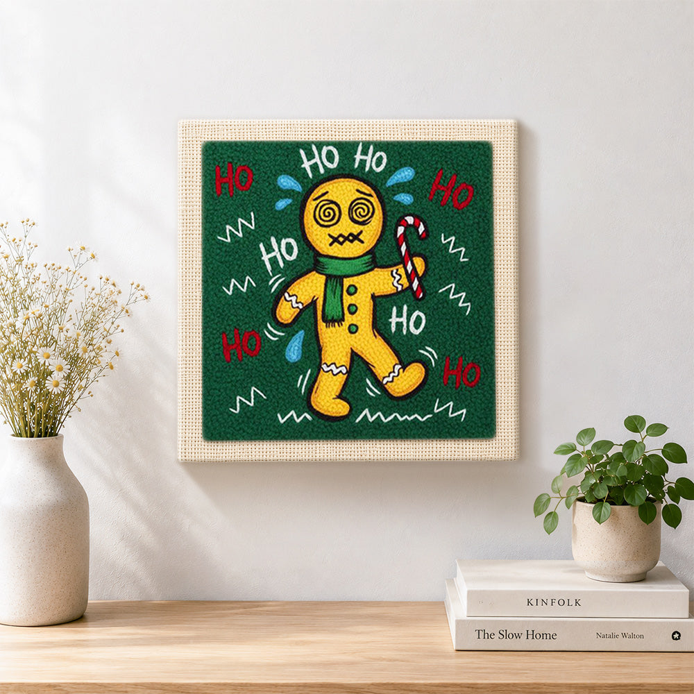 Finished sweating dizzy gingerbread man artwork displayed on a wall