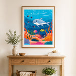 Finished sweet dolphin swim cross stitch artwork displayed as home decor