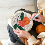 Creating handmade sweet fruit with leaves punch needle artwork