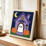 Sweet ghost at boo haunted house punch needle artwork displayed on a table