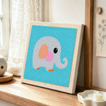 Sweet gray elephant punch needle artwork displayed on a table
