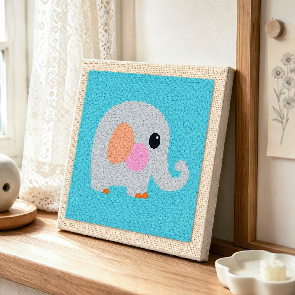 Sweet gray elephant punch needle artwork displayed on a table