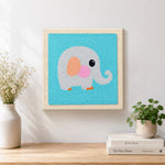 Finished sweet gray elephant artwork displayed on a wall