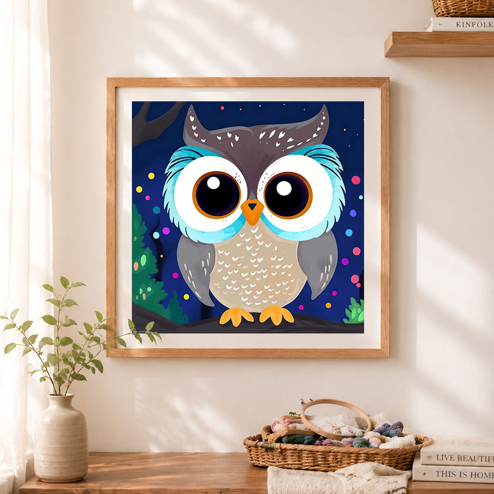 Finished sweet night owl cross stitch artwork displayed as home decor