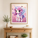 Finished sweet pastel winged unicorn cross stitch artwork displayed as home decor