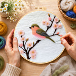 Creating the sweet pink blossom bird wool painting by hand with a felting needle